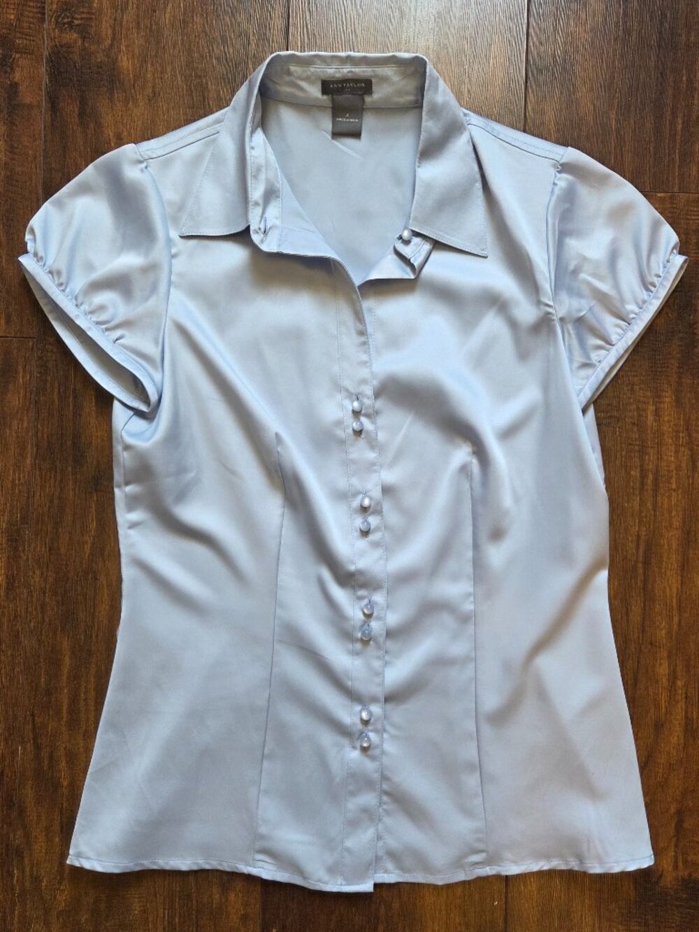 Light Blue Ann Taylor button-down blouse with a satin finish in size 2
